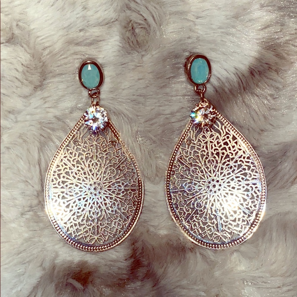Oval decorative drop earrings. 2 1/4”
